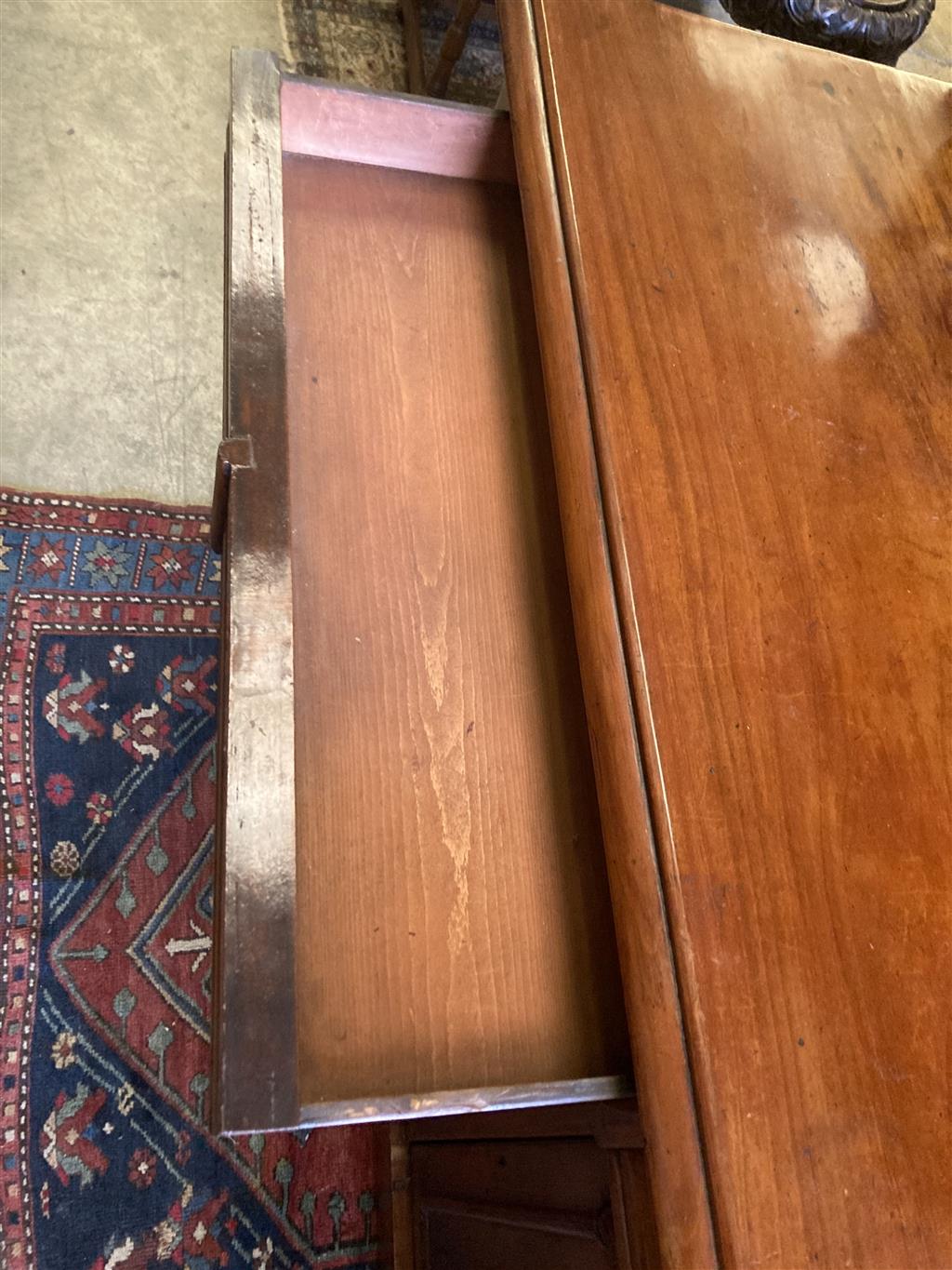 A Victorian carved mahogany sideboard fitted drawers and cupboard, length 150cm, depth 56cm, height 166cm